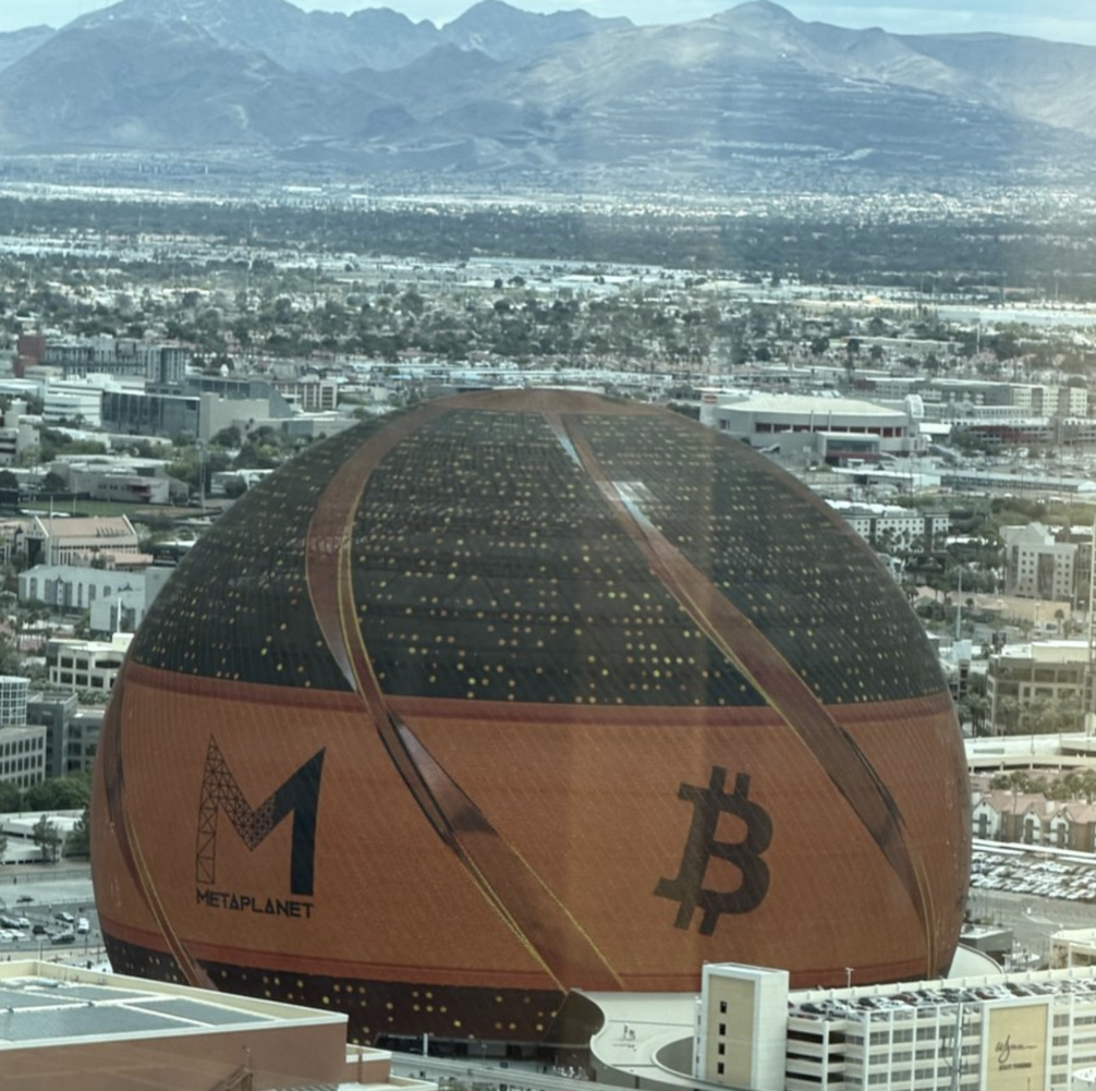 The Las Vegas Sphere with Metaplanet and Bitcoin branding, photographed from David's hotel room at Bitcoin 2026